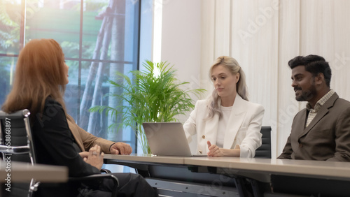 business meeting and people and managers or presenter for company planning Happy people talking with customers in conference room and funny conversations on laptops