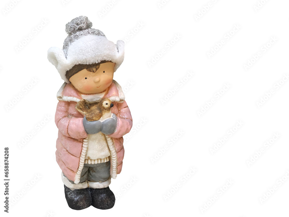 Cute decoration for the Christmas tree. A beautiful figurine of a little boy in warm clothes. who holds a bird in his hands on a white isolated background. Holiday, celebration, New Year, Noel concept Cute decoration for the Christmas tree. A beautiful figurine of a little boy in warm clothes. who holds a bird in his hands on a white isolated background. Holiday, celebration, New Year, Noel concept