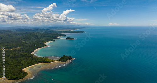 Aerial drone of bays and lagoons with beaches on the coast of the island of Borneo. Sabah, Malaysia.