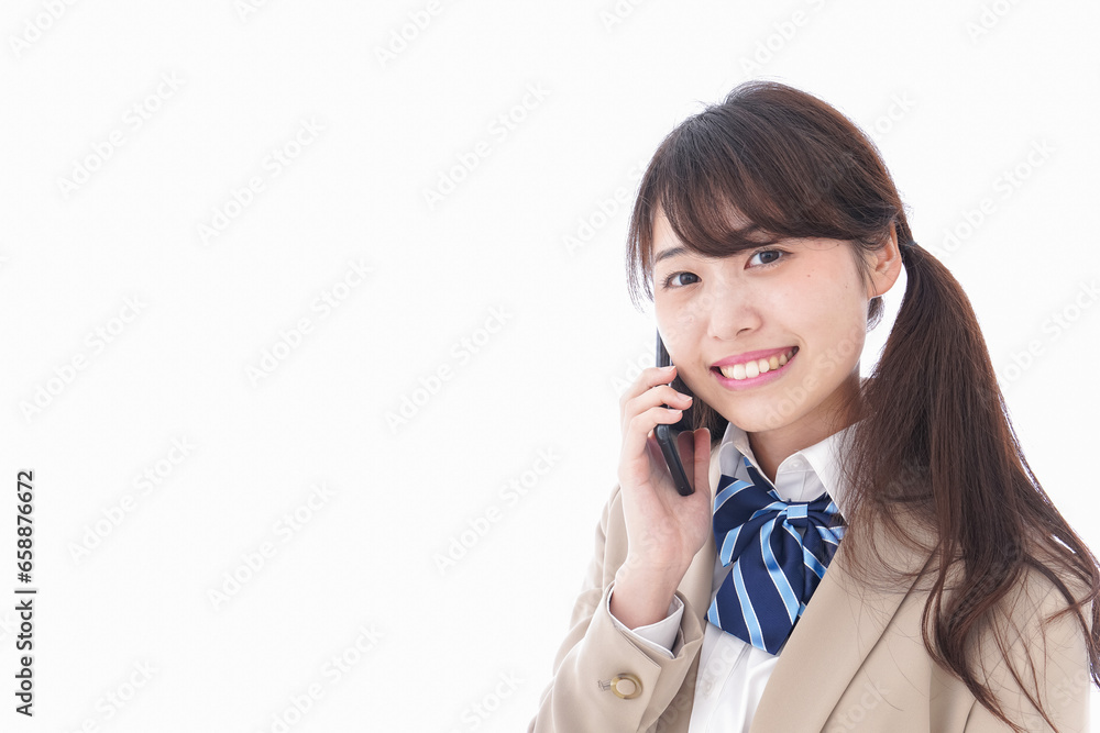 電話をする学生