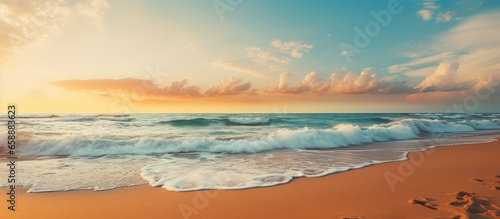 Expansive serene sky and sea serene sunset sandy beach peaceful sunlight summer ambiance inspiring nature scene With copyspace for text