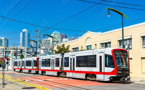 Municipal light rail tram on 4th street in San Francisco - California, United States photo