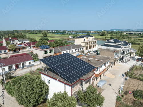 solar panels on  roof of house © zhu difeng