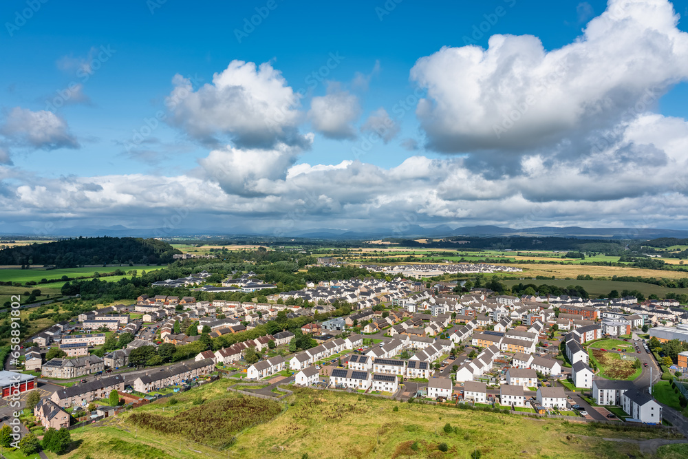 Aerial view of the city of Stirling at the foot of the medieval castle located on a hill, Scotland