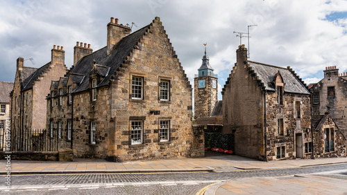 Bild auf Leinwand Old buildings with clock tower in the medieval city of Stirling, Scotland