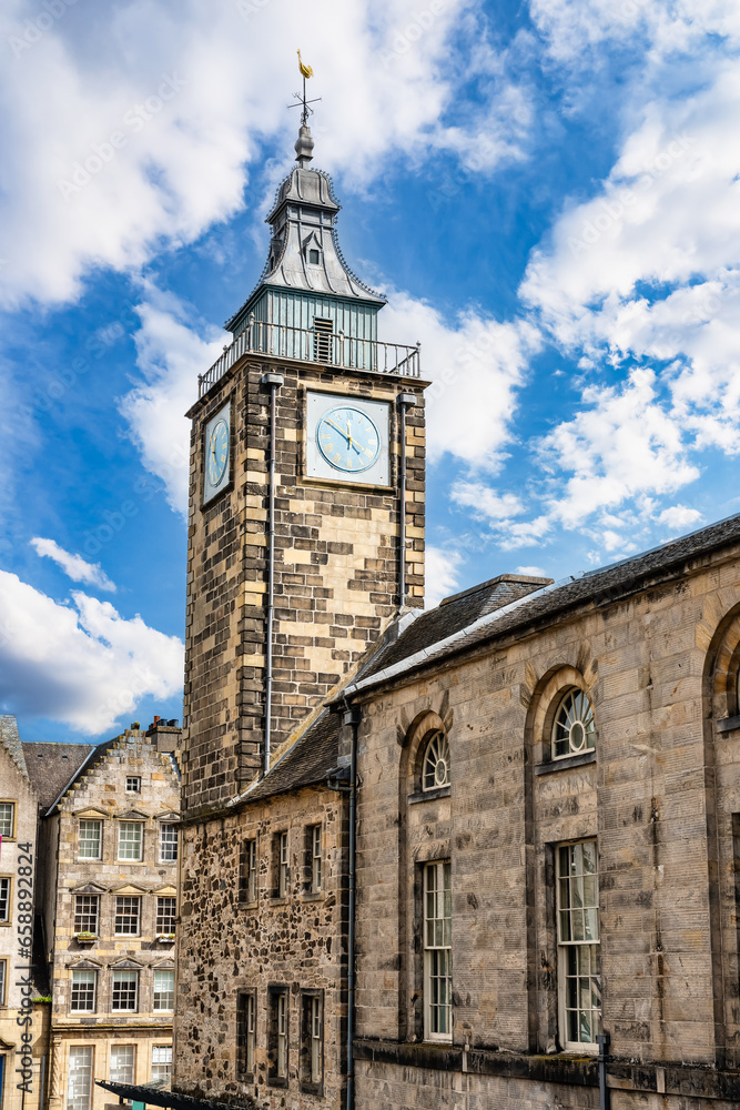 Clock tower and ancient buildings in the medieval city of Stirling, Scotland. Clock tower and ancient buildings in the medieval city of Stirling, Scotland.
