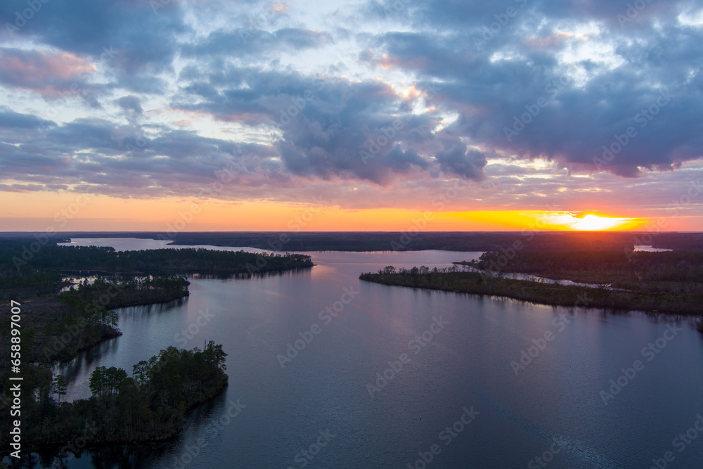 Aerial view of a lake at sunset