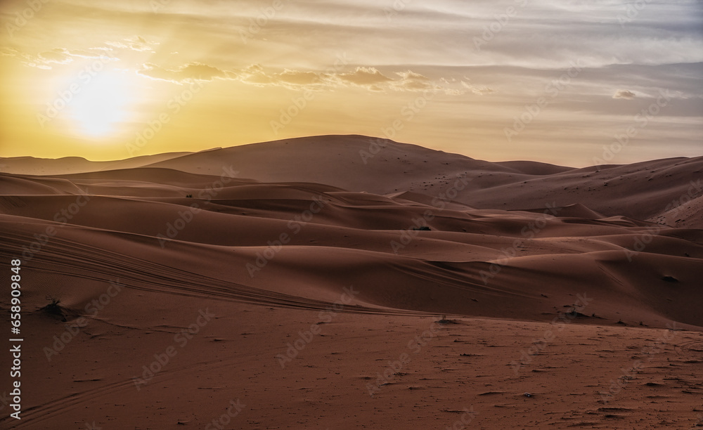 Sun shining over sandy desert, Sahara, Morocco