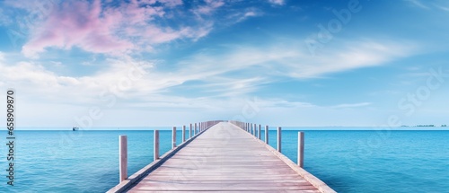 Scenic Bridge to Pier: Ocean and Sky Fusion with Clear Waterscape © Maximilien