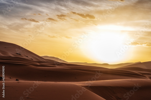 Sun shining over sandy desert, Sahara, Morocco