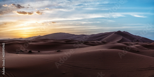 beautiful sand dunes  the setting sun shone over the desert