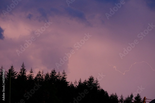 lightning on a purple sky