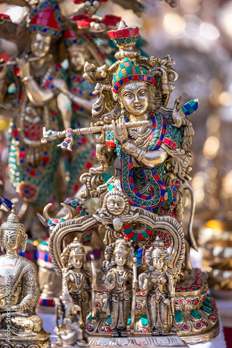 Brass metal art, Handmade Indian cultural and hindu god sculpture souvenir made with brass with plain background. Selective focus.