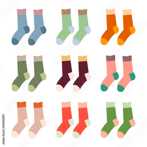 Set Knitted Socks in various colors. Popular hobby. Accessories made of wool and cotton. Flat vector illustration.