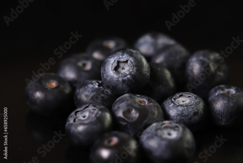 Blueberries isolated on black background