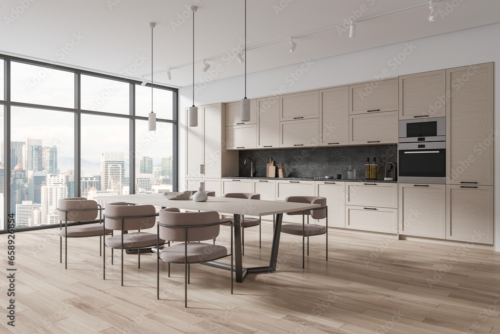 Wooden and white kitchen corner with cabinets and table Wooden and white kitchen corner with cabinets and table