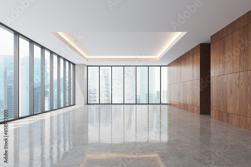 Light empty business hall with panoramic window on Singapore skyscrapers