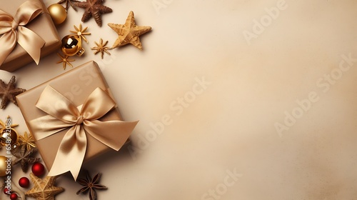 Christmas decoration composition on a light gold empty background with pines and Christmas gift box, top view with copy space for text