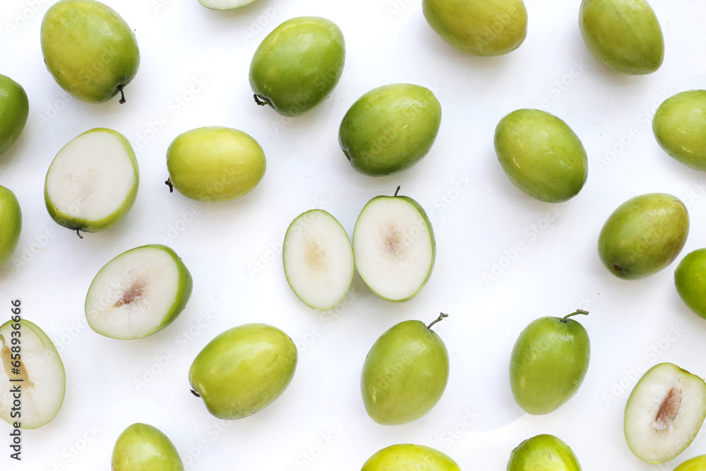 Green jujube fruits on white background. Green jujube fruits on white background.