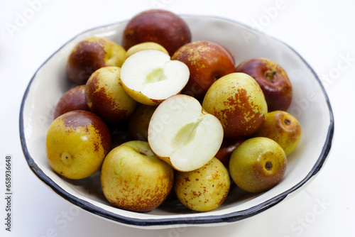 Fresh jujube fruit on white background
