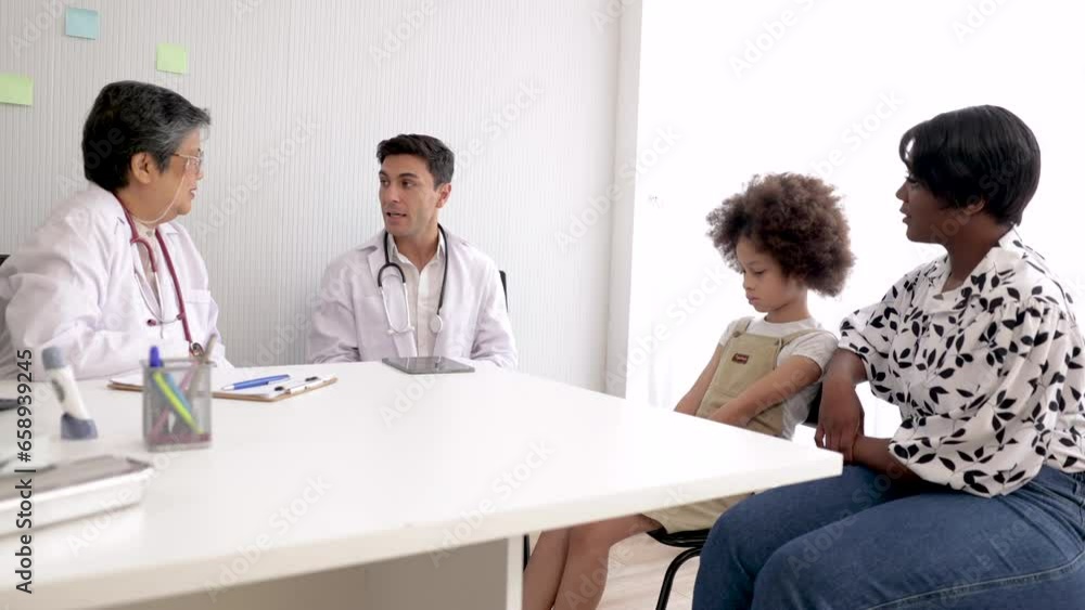 4K Team pediatrician diagnoses multicultural kid girl in clinic, mother and sickness daughter doctor visit, physician wearing white coat stethoscope using laptop collect health care examination 4K Team pediatrician diagnoses multicultural kid girl in clinic, mother and sickness daughter doctor visit, physician wearing white coat stethoscope using laptop collect health care examination
