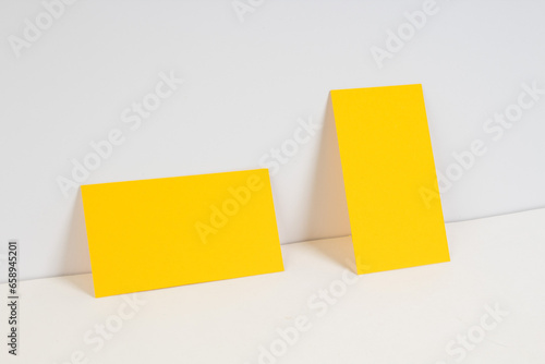 Blank golden business cards on the white background. Template for ID.