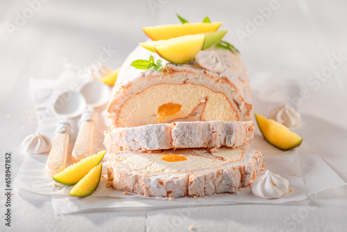 Tableau sur toile Homemade mango swiss roulade served as spring dessert.