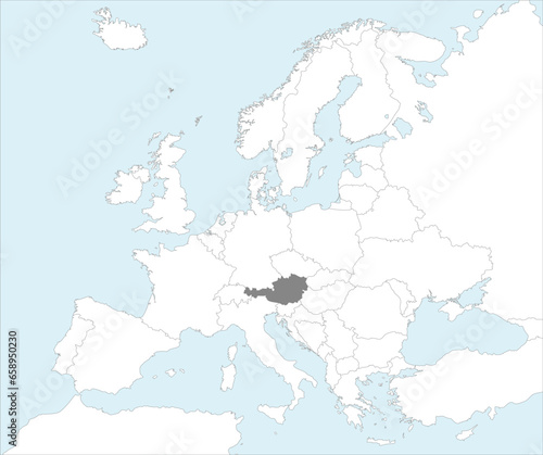 Gray CMYK national map of AUSTRIA inside detailed white blank political map of European continent on blue background using Mollweide projection