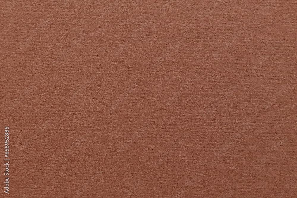 Brown paper with a soft fine texture background. Brown paper with a soft fine texture background.