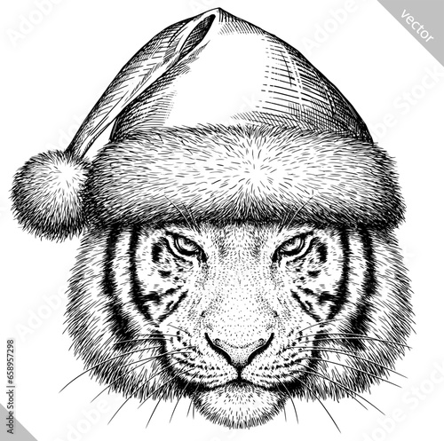 Vintage engraving isolated tiger set dressed christmas illustration ink santa costume sketch. Africa wild cat background animal silhouette new year hat art. Black and white hand drawn vector image