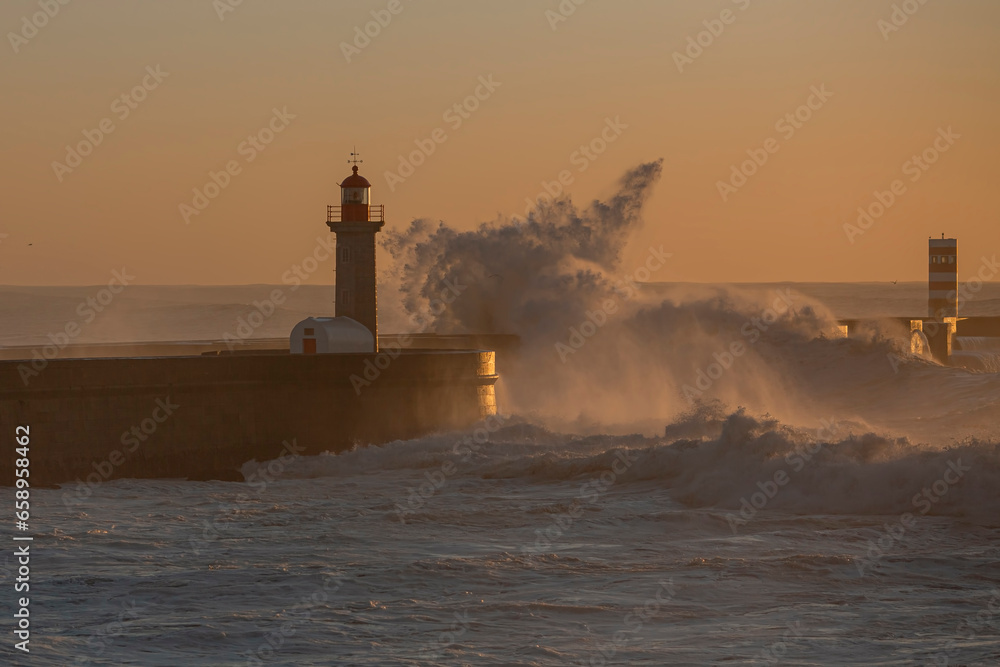Big waves in front of the lighthouse in Porto, Portugal.