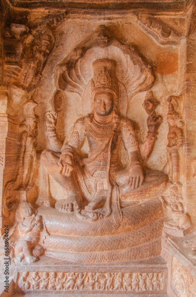 Vishnu sitting on Sheshnag, Badami cave temple, Badami, Karnataka, India.