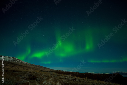 aurora borealis over the mountains © Keitaro