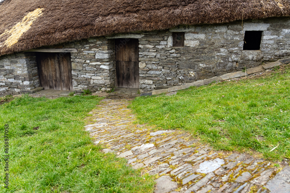 Traditional houses called pallozas with their thatched roofs in the beautiful village of O Cebreiro, which is a crossing point on the way of Santiago, Lugo.Spain