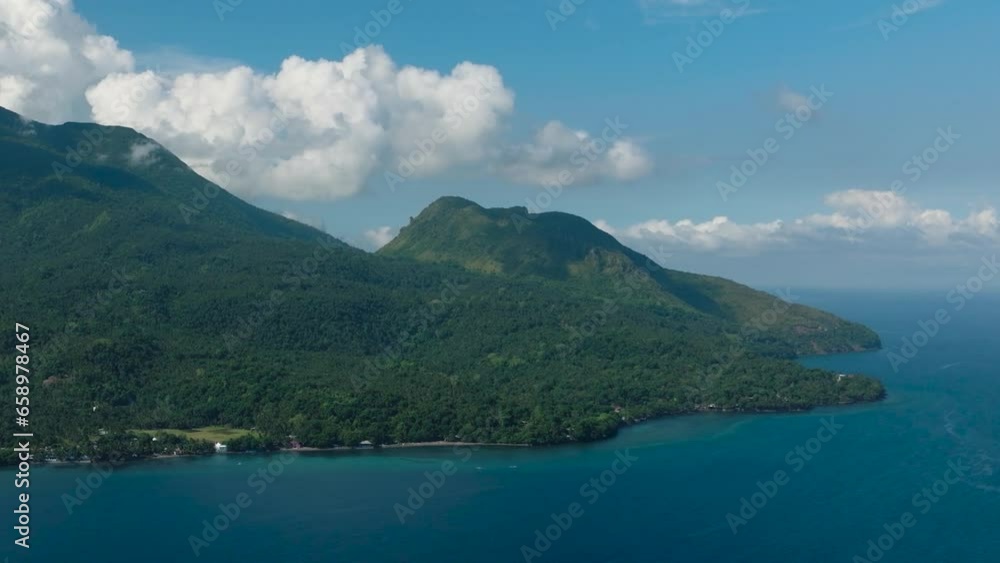 Tropical Island surounded by deep blue sea. Camiguin Island. Philippines. Tropical Island surounded by deep blue sea. Camiguin Island. Philippines.