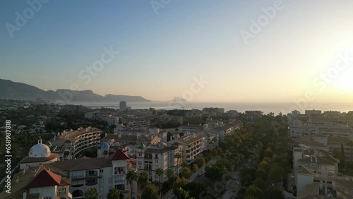 Aerial view of village Alfaz del Pi,  L'Albir with Altea and mediterranen sea in background. Sunrise Spain