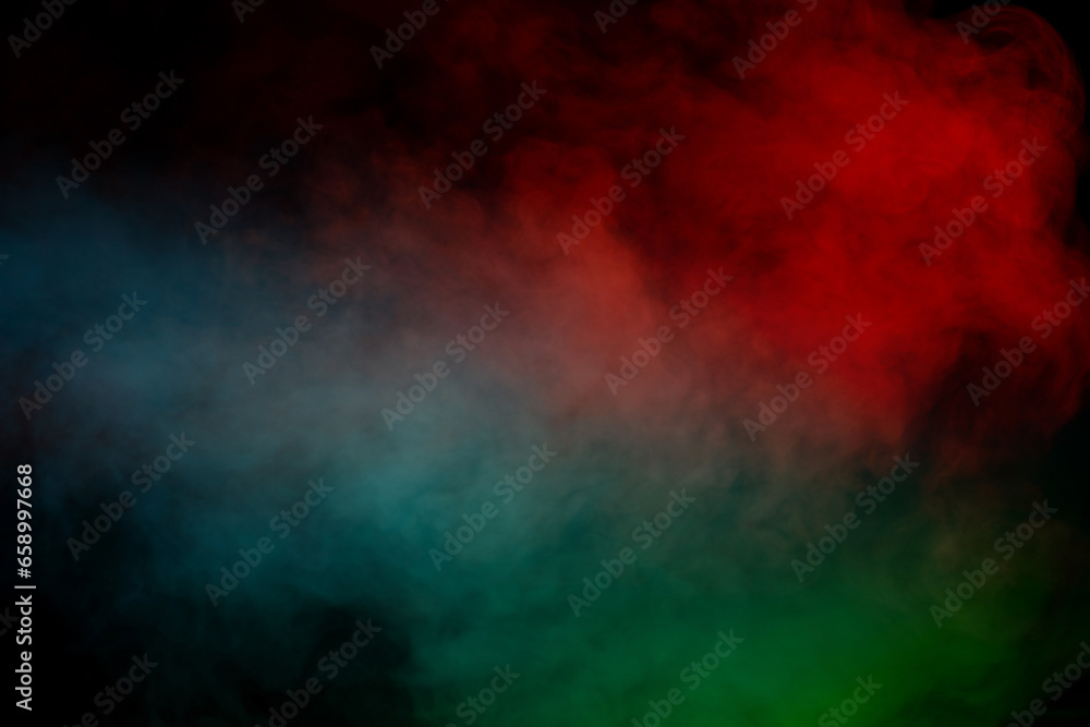 Blue and green steam on a black background. Blue and green steam on a black background.