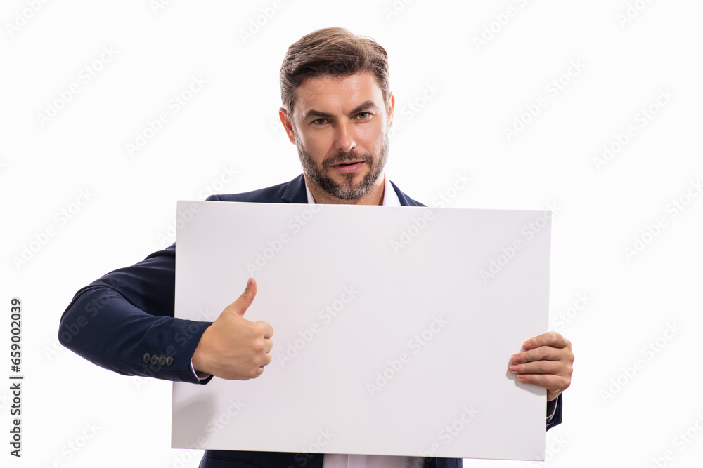 Man holds the white sign, blank card. Placard ready for your product. Sign to your text. Man showing thumbs up and blank sign board over studio background. Empty blank board. Area for advertising. Man holds the white sign, blank card. Placard ready for your product. Sign to your text. Man showing thumbs up and blank sign board over studio background. Empty blank board. Area for advertising.