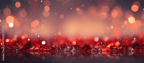 Abstract bokeh background with falling snowflakes and blank space for content
