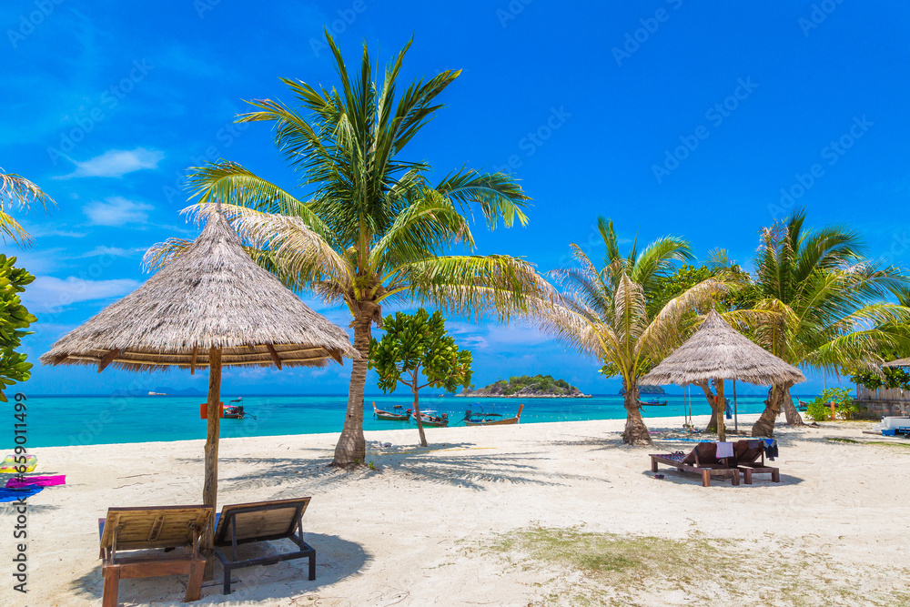 Parasol, sunbed on beach