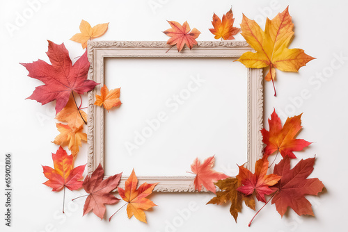 Photo frame with autumn leaves, thanksgiving day concept.