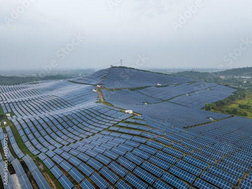 view of solar power panels on hill