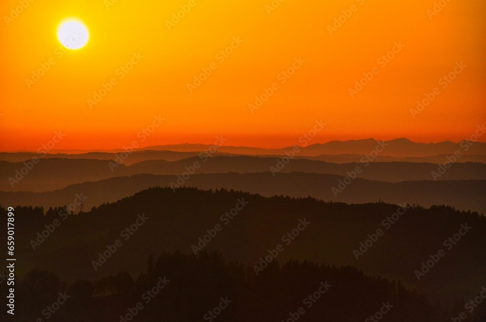 Sunset on the Schnebelhorn. Sun just before setting. Nice evening atmosphere. Zurich, Switzerland. High quality photo