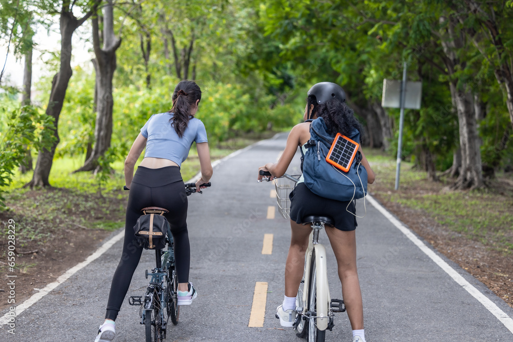 Naklejka premium Biker fuse eco-awareness, cycling for fitness, solar for device power, and recycling into lifestyle