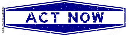 Grunge blue act now word hexagon rubber seal stamp on white background