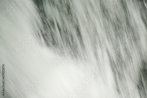 water falling on river pass rock and stone at north Chet Kod waterfall in Thailand 