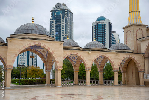 The courtyard of the Heart of Chechnya Mosque against the background of the Grozny City complex, Chechen Republic. Russia