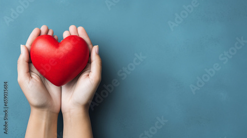 hands hold a red heart on a blue background. ai generative