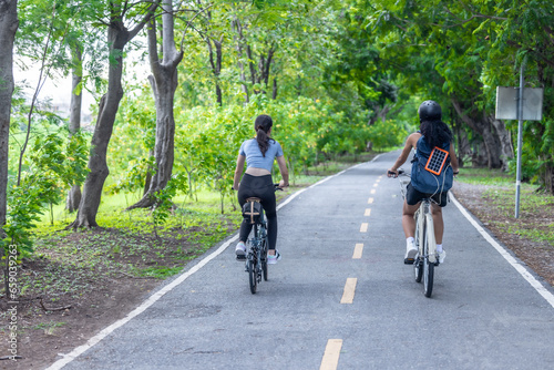Wallpaper Mural Biker fuse eco-awareness, cycling for fitness, solar for device power, and recycling into lifestyle Torontodigital.ca