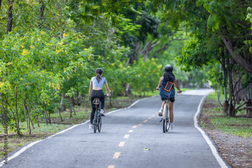 Biker fuse eco-awareness, cycling for fitness, solar for device power, and recycling into lifestyle